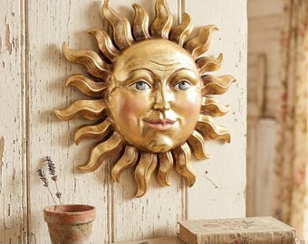 Hanging sun sculpture, carved from Valgardena wood and hand-decorated, handcrafted in Italy.