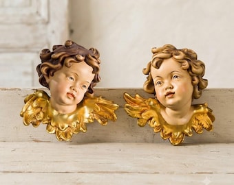 Pair of angel and cherub sculptures, carved in Valgardena wood and decorated by hand, Italian artisan production, various sizes