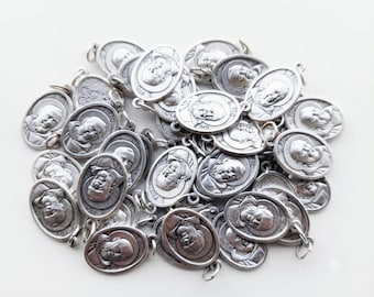 Set of medals of Saint Padre Pio of Pietrelcina measuring 2.5 x 1.5 cm (0.98 x 0.59 inches) of Italian artisan production in various quantities