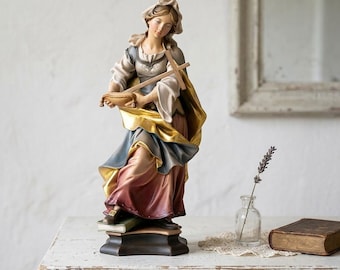 Statue of Saint Margaret carved from Valgardena wood and hand-decorated, handcrafted in Italy.