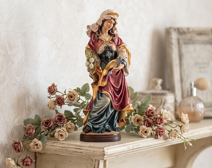 Sculpture of Saint Ursula carved in Valgardena wood and hand-decorated, Italian artisan production, various sizes available