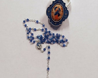 Rosary of Our Lady Mary Undoer of Knots in blue crystal with deluxe case, handcrafted in Italy
