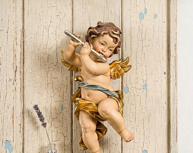 Angel sculpture, putto with flute, carved in Valgardena wood and decorated by hand, various sizes, handcrafted in Italy