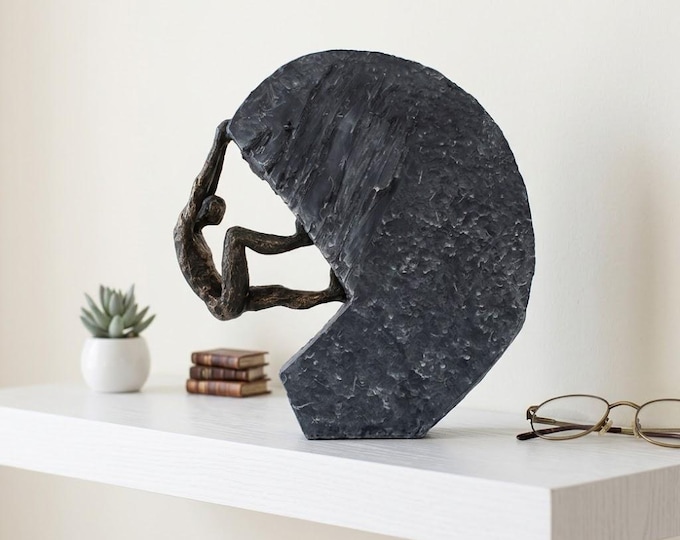 Classic sculpture Beyond all Limits, 22 cm (8.66 inches) in bronzed resin marble, handcrafted in Italy