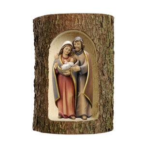 Nativity scene carved in Valgardena wood and decorated by hand, in tree trunk, Italian artisan production