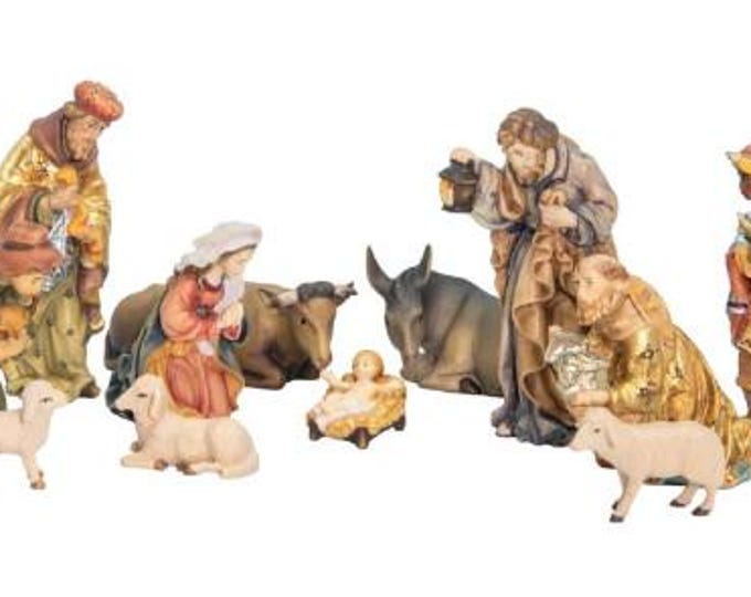 Complete nativity scene with 12 figurines, carved from Valgardena wood, various sizes available, handcrafted in Italy
