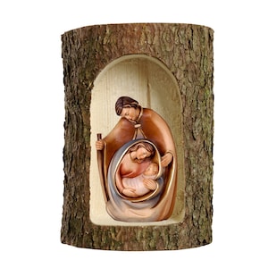 Nativity scene carved in Valgardena wood and decorated by hand, in tree trunk, Italian artisan production