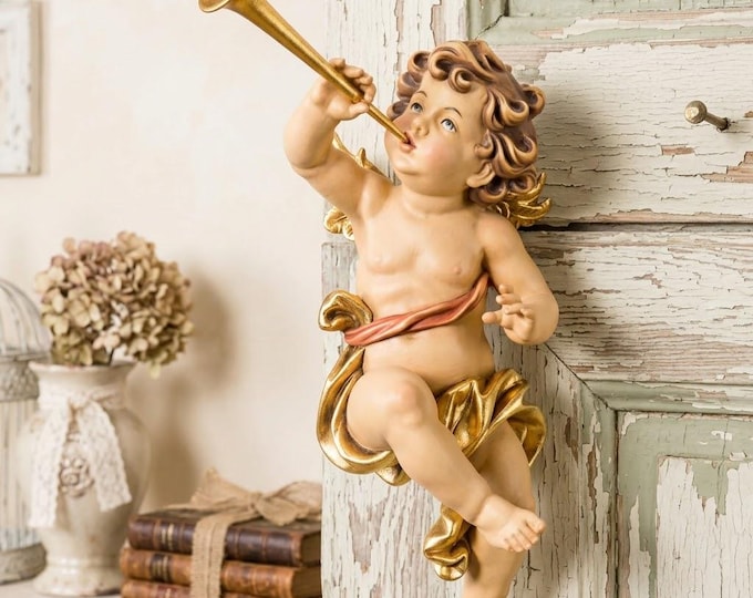 Angel sculpture, putto with trumpet, carved in Valgardena wood and decorated by hand, various sizes, handcrafted in Italy