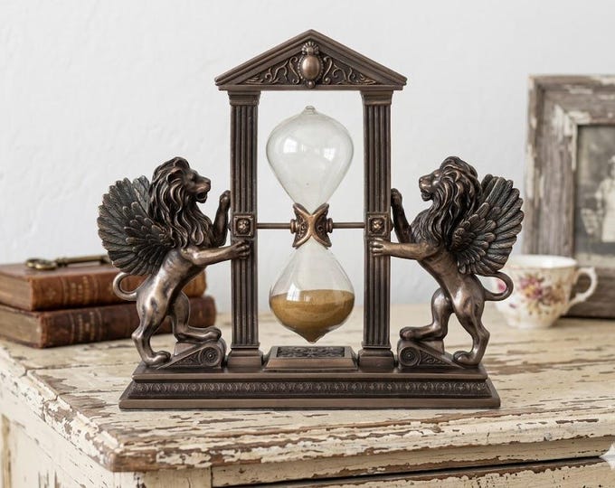 Classic sculpture Hourglass with Winged Lions, 18 cm (7.08 inches) in bronzed resin marble, handcrafted in Italy