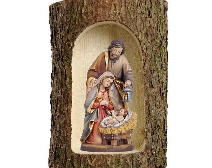 Nativity scene carved in Valgardena wood and decorated by hand, in tree trunk, Italian artisan production