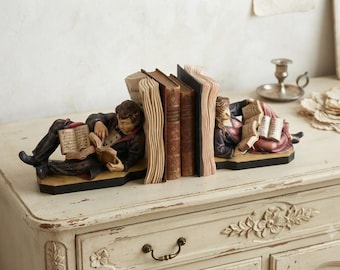 Bookend sculpture, carved from Valgardena wood and hand-decorated, handcrafted in Italy.