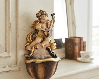 Holy water stoup with angel, carved in Valgardena wood, hand-decorated with oil colors and gold leaf, made in Italy