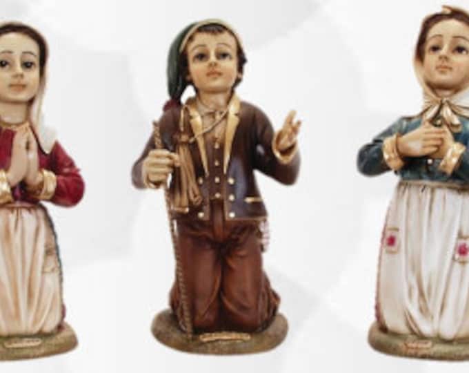 Set of three statues, shepherds of Fatima, 32 cm (12.59 inches) made of finely hand-decorated resin, handcrafted