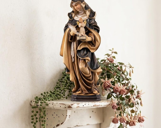 Sculpture of Saint Francesca carved in Valgardena wood, hand-decorated and handcrafted in Italy.