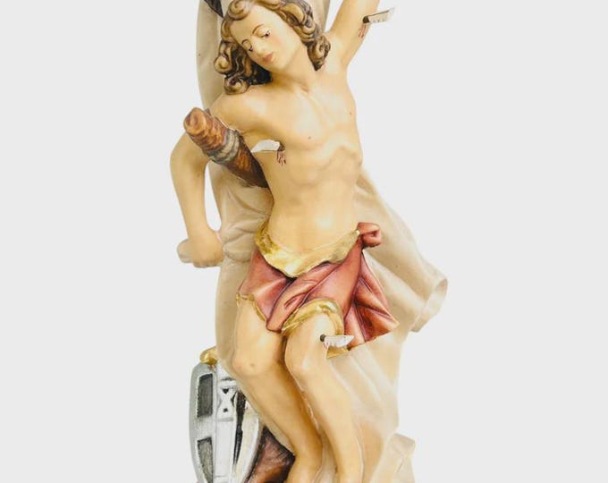 Statue of Saint Sebastian carved in Valgardena wood, hand-decorated, Italian artisan production, various sizes.