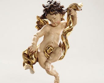 Hanging guardian angel carved from Valgardena wood and hand-decorated, handcrafted in Italy.
