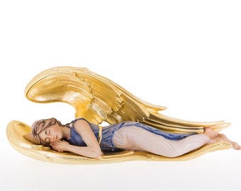 Sleeping angel, carved in Valgardena wood and hand-decorated, two colors available, handcrafted in Italy.