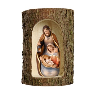 Nativity scene carved in Valgardena wood and decorated by hand, in tree trunk, Italian artisan production