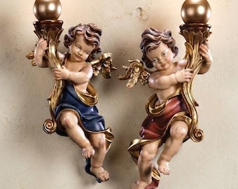 Hanging angel with candle carved from Valgardena wood and hand-decorated, handcrafted in Italy.