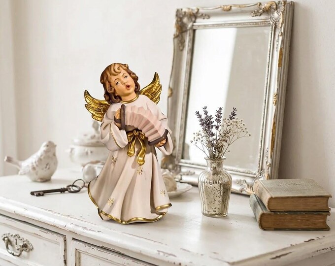 Angel Symphony sculpture, putto with accordion, carved in Valgardena wood, various sizes, handcrafted in Italy