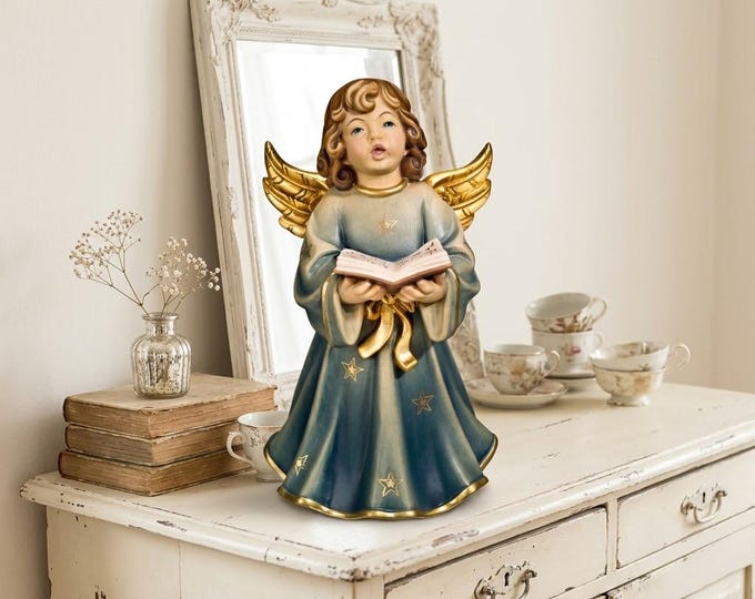 Angel Symphony sculpture, putto with book, carved in Valgardena wood, various sizes, handcrafted in Italy