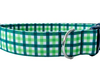 May include: Green and white plaid dog collar with a silver D-ring.
