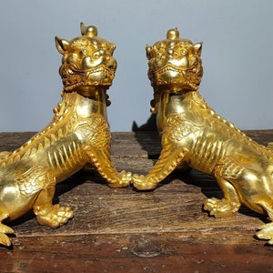 A pair of Chinese pure hand carved pure copper gilt auspicious beast statue ornaments,precious and unique,worth collecting