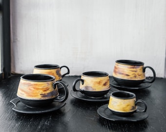 Handmade Ceramic Tea Cup and Saucer Set: Minimalist Black Stoneware Mug