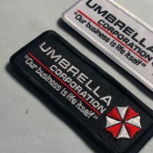 UMBRELLA CORPORATION Onze zaak is het leven zelf Patch Moreel Tactisch uniform Militair Ingezetene Scherpschutter Kwaad Biohazard Wasbeer