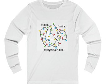 May include: White long-sleeve t-shirt with a tangled string of Christmas lights and the text "It's fine. I'm fine. Everything is fine."