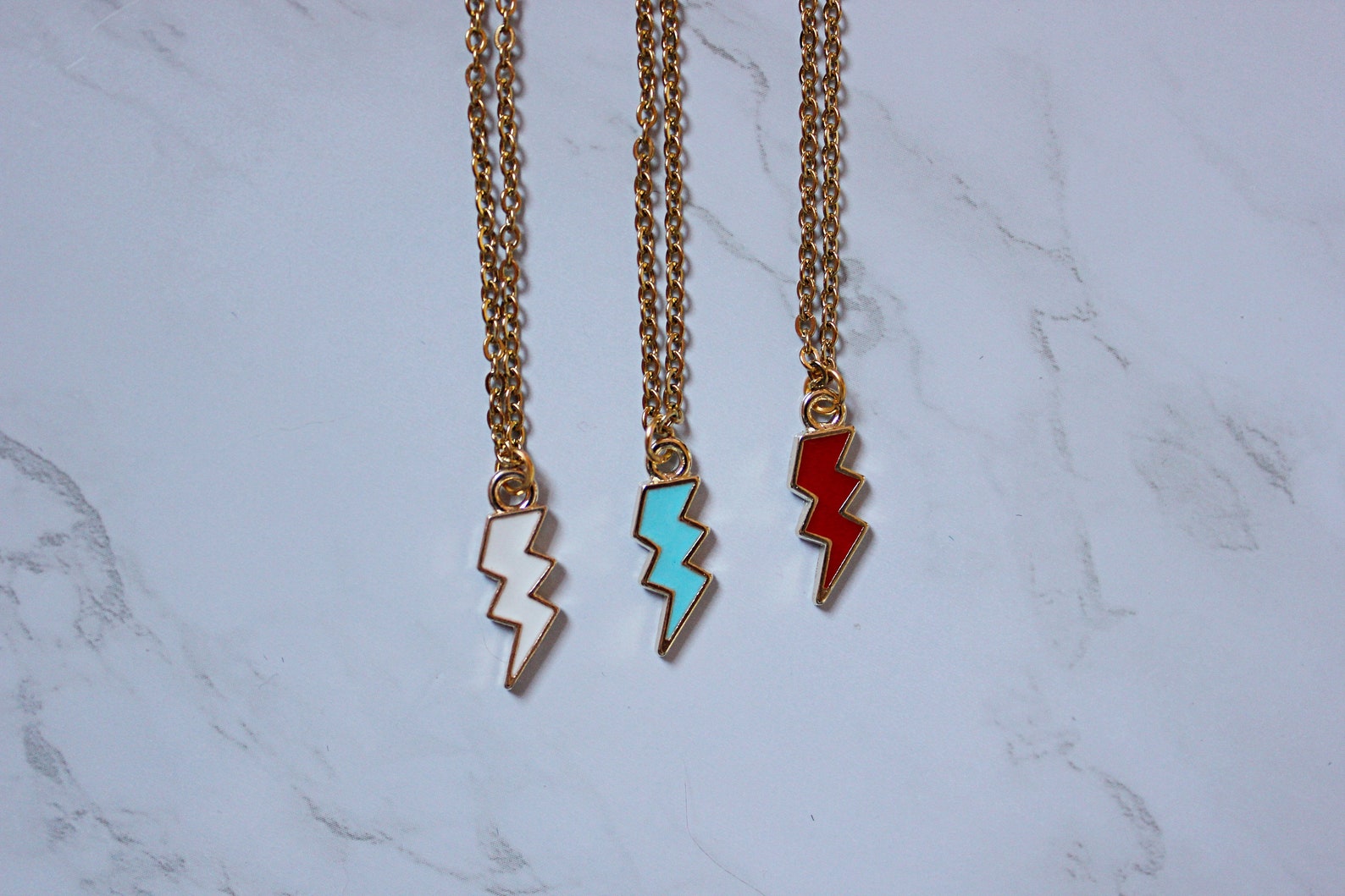 Gold lightning bolt necklace white red and blue lightning Etsy