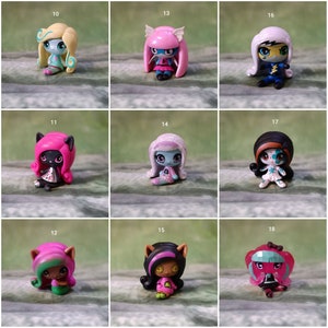 May include: Nine small plastic dolls with different hair colors and styles. Each doll is wearing a different outfit and has a unique face. The dolls are all sitting down and have a cartoonish style.
