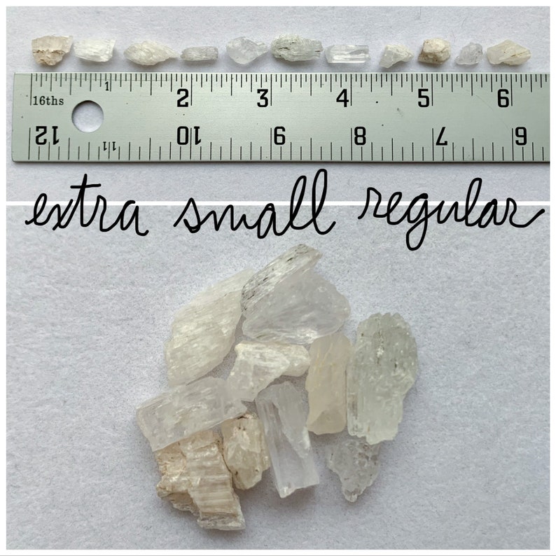 Top photo is of all of the extra small regular stones lined up against a ruler (in inches). Bottom photo is of all of the extra small regular stones lined up next to each other on a white background.