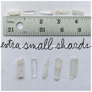 Top photo is of all of the extra small shards stones lined up against a ruler (in inches). Bottom photo is of all of the extra small shards stones lined up next to each other on a white background.