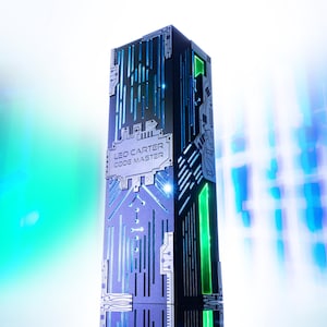 May include: A tall, rectangular black tower with intricate silver circuit board patterns and glowing green light accents. The front panel features a silver plaque with the text LEO CARTER CODE MASTER engraved in a clean, modern sans-serif font.