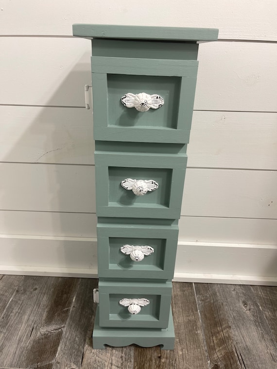 Small narrow sale cabinet with doors
