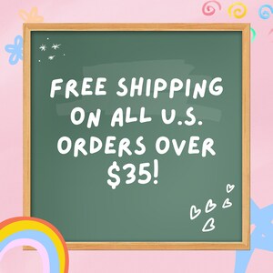 May include: A green chalkboard with a wooden frame announces "FREE SHIPPING ON ALL U.S. ORDERS OVER $35!" in white text.