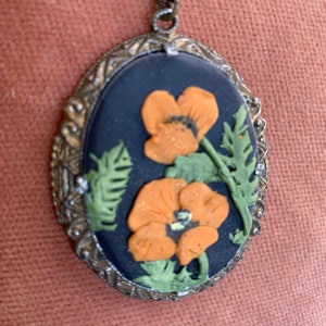 Orange poppy necklace.