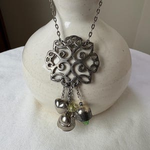 silver charm assemblage necklace