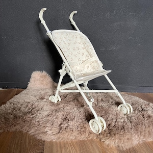 Doll stroller seat/cover