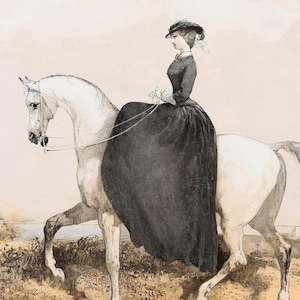 May include: An antique illustration depicts a woman in a long black dress and hat riding a white horse. The horse is in profile, with the woman holding the reins. The background features a landscape with a body of water.