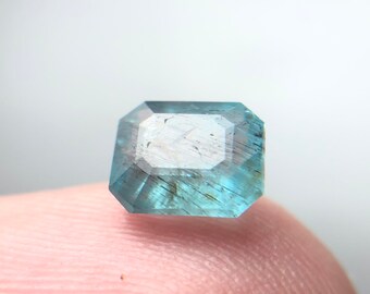 Rare Needles Like Crystal in Sky Blue Apatite top cut gemstone from Africa