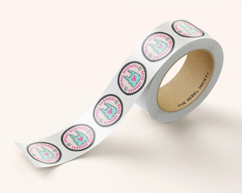 May include: A roll of white stickers with a pink and teal design. Each sticker features a shopping bag with a heart and the text "SMALL BUSINESS SUPPORT CLUB". The roll's core has the text "THE REBEL SOCIETY".