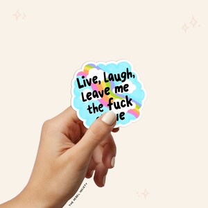 May include: A sticker with a rainbow and clouds that says "Live, Laugh, Leave me the fuck alone".