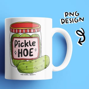 May include: White ceramic mug with a colorful illustration of a jar of pickles with the text "Pickle Hoe" and the words "The Rebel Society" at the bottom.