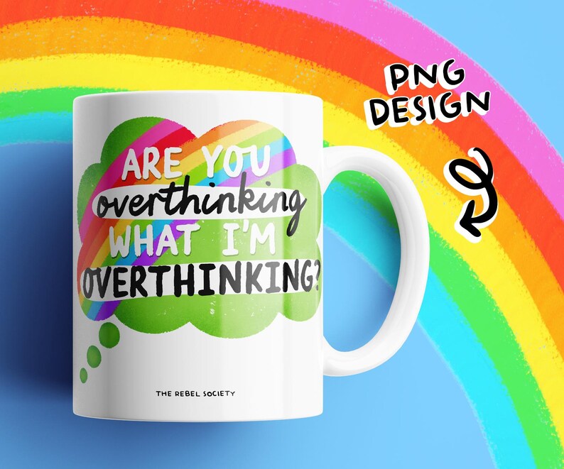 May include: White ceramic mug with a curved handle. The mug features the text "ARE YOU overthinking WHAT I'M OVERTHINKING?" in a colorful design. The mug has the text "THE REBEL SOCIETY" at the bottom.