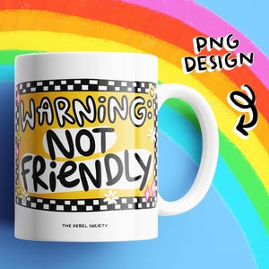 May include: A white ceramic mug featuring a yellow rectangular graphic with a black and white checkered border. The text reads WARNING: NOT FRIENDLY in bold black letters. Small white flowers, pink diamonds, and yellow smiley faces decorate the design.