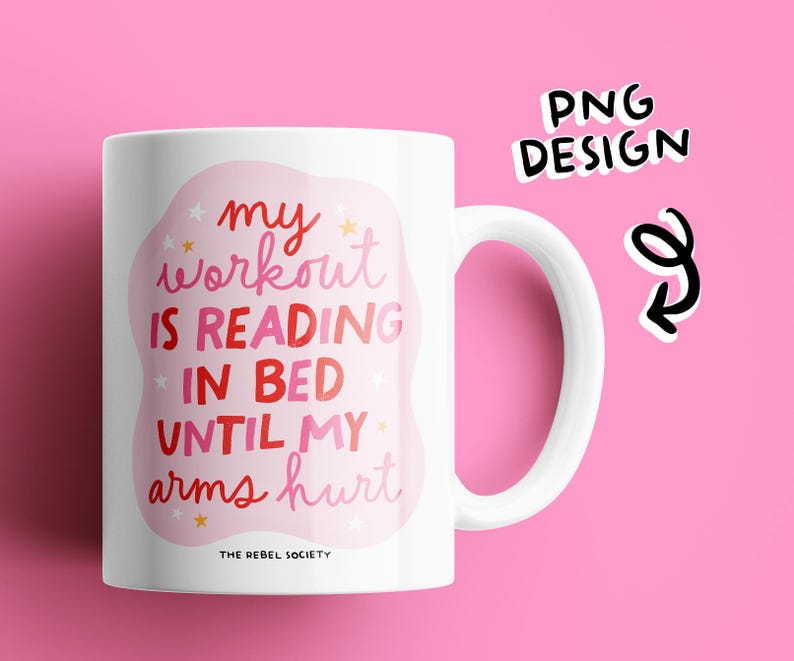 May include: White ceramic mug with a pink and red design that says "my workout is reading in bed until my arms hurt". The mug has a black handle and the text "The Rebel Society" is printed on the bottom.
