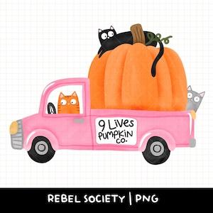 May include: A pink pickup truck illustration with a large orange pumpkin in the bed. A black cat rests on the pumpkin, an orange tabby cat sits in the driver seat, and a gray cat peeks from the back. The truck door reads 9 Lives PUMPKIN CO.