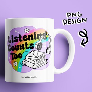 May include: White ceramic mug with a rainbow and cloud design. The text "Listening Counts Too" is written in black with a retro font. A stack of books and headphones are in the cloud. The text "The Rebel Society" is at the bottom of the mug.